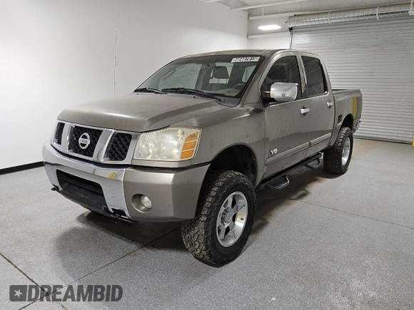 2006 Nissan Titan LE z VIN 1N6AA07BX6N573134, wystawiony jako Copart lot #46487815 z przebiegiem 161 174 mil mil oraz Czysty tytuł • Clean title. Historia ofert i sprzedaży dostępna na DreamBid. Obrazek 1.