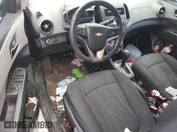 2013 Chevrolet Sonic LT with VIN 1G1JC5SH9D4137246, listed as a Copart auction lot 56001065 with 141,545 mi miles and Clean Title. Bid and sale history available at DreamBid. Image 8.