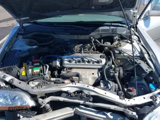 1999 Honda Accord LX with VIN JHMCG5545XC028563, listed as a IAAI auction lot 42461054 with 212,100 mi miles and . Bid and sale history available at DreamBid. Image 10.