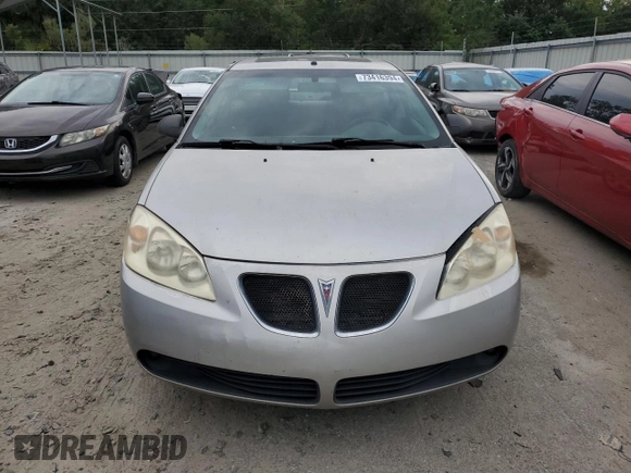 2006 Pontiac G6 GTP z VIN 1G2ZM551364162379, wystawiony jako Copart lot #73416394 z przebiegiem 218 222 mil mil oraz Szkoda całkowita • Salvage title. Historia ofert i sprzedaży dostępna na DreamBid. Obrazek 5.