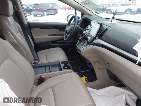 2023 Honda Odyssey Touring with VIN 5FNRL6H84PB048916, listed as a IAAI auction lot 41325052 with 50,290 mi miles and . Bid and sale history available at DreamBid. Image 5.