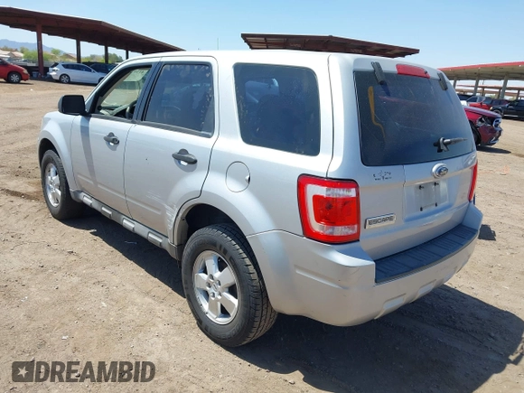 2009 Ford Escape XLS with VIN 1FMCU02749KC57784, listed as a IAAI auction lot 41981387 with 216,935 mi miles and . Bid and sale history available at DreamBid. Image 3.