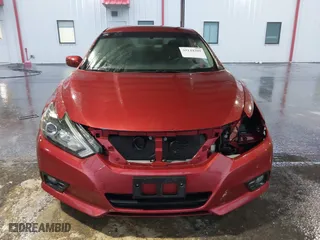 2016 Nissan Altima 2.5 SL with VIN 1N4AL3AP2GC211238, listed as a IAAI auction lot 39144309 with 102,669 mi miles. Bid and sale history available at carsss.com. Image 13.