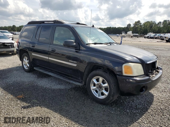 2006 GMC Envoy SLT with VIN 1GKET16S266111770, listed as a Copart auction lot 72938754 with 231,161 mi miles and Salvage Title. Bid and sale history available at DreamBid. Image 4.