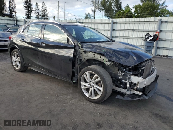 2018 Infiniti QX30 Premium with VIN SJKCH5CP9JA057155, listed as a Copart auction lot 84965074 with 91,679 mi miles and Salvage title. Bid and sale history available at DreamBid. Image 4.