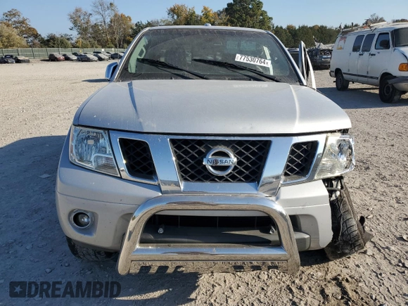 2015 Nissan Frontier S with VIN 1N6AD0EV3FN705610, listed as a Copart auction lot 77530764 with 165,782 mi miles and Salvage title. Bid and sale history available at DreamBid. Image 5.