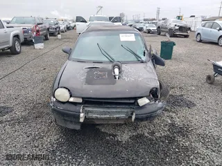 1999 Dodge Neon Competition with VIN 1B3ES47C9XD111397, listed as a IAAI auction lot 41702657 with 210,033 mi miles. Bid and sale history available at carsss.com. Image 13.