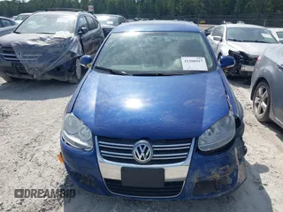 2009 Volkswagen Jetta SE z VIN 3VWRZ71K99M159242, wystawiony jako IAAI lot #42200917 z przebiegiem 226 285 mil mil oraz . Historia ofert i sprzedaży dostępna na DreamBid. Obrazek 13.