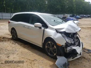 2022 Honda Odyssey Elite with VIN 5FNRL6H94NB006185, listed as a Copart auction lot 61302425 with Not provided miles and Salvage title. Bid and sale history available at DreamBid. Image 4.