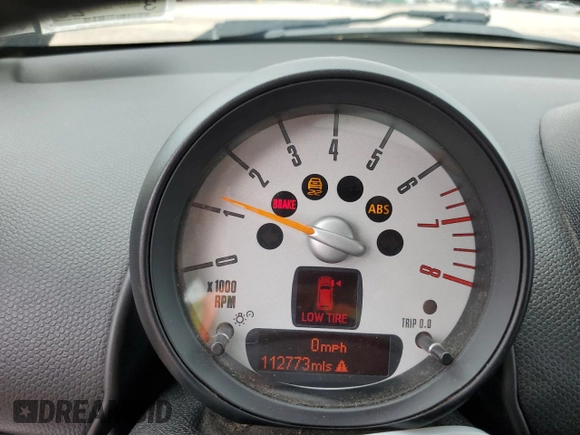 2014 MINI Countryman S z VIN WMWZC5C54EWM17898, wystawiony jako Copart lot #62119635 z przebiegiem 112 773 mil mil oraz Szkoda całkowita • Salvage title. Historia ofert i sprzedaży dostępna na DreamBid. Obrazek 9.