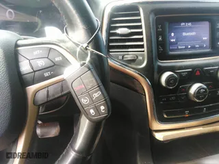 2014 Jeep Grand Cherokee Laredo with VIN 1C4RJEAG3EC393866, listed as a IAAI auction lot 41863877 with 134,977 mi miles. Bid and sale history available at carsss.com. Image 11.
