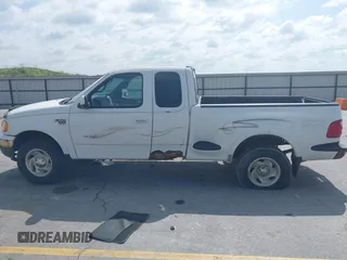 2000 Ford F-150 z VIN 2FTRX08W3YCA83858, wystawiony jako IAAI lot #42569957 z przebiegiem Nie podano mil oraz . Historia ofert i sprzedaży dostępna na DreamBid. Obrazek 14.