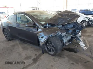 2024 Tesla Model Y with VIN 7SAYGDED5RF194219, listed as a IAAI auction lot 41594132 with 21,255 mi miles and . Bid and sale history available at DreamBid. Image 1.