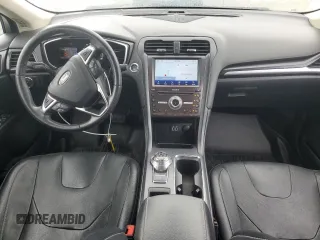 2020 Ford Fusion Titanium with VIN 3FA6P0D96LR175863, listed as a Copart auction lot 60570305 with 76,064 mi miles and Salvage title. Bid and sale history available at DreamBid. Image 8.