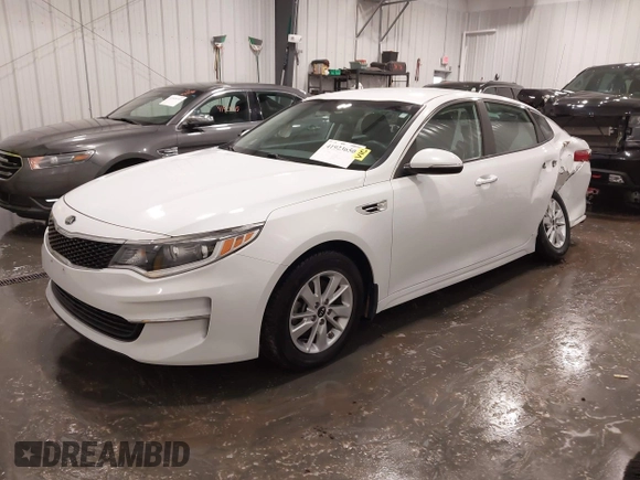 2016 Kia Optima LX with VIN 5XXGT4L38GG048180, listed as a IAAI auction lot 41923650 with 58,018 mi miles. Bid and sale history available at carsss.com. Image 2.