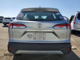 2022 Toyota Corolla Cross L with VIN 7MUAAABG0NV011057, listed as a Copart auction lot 50907545 with 59,328 mi miles and Salvage title. Bid and sale history available at DreamBid. Image 6.