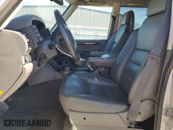 2002 Land Rover Discovery with VIN SALTW12412A748747, listed as a Copart auction lot 47189965 with 130,237 mi miles and Salvage Title. Bid and sale history available at DreamBid. Image 7.