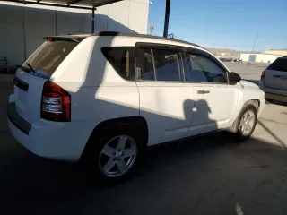 2009 Jeep Compass North with VIN 1J4FT47B79D160392, listed as a Copart auction lot 87213674 with 79,625 mi miles and Salvage Title. Bid and sale history available at carsss.com. Image 3.
