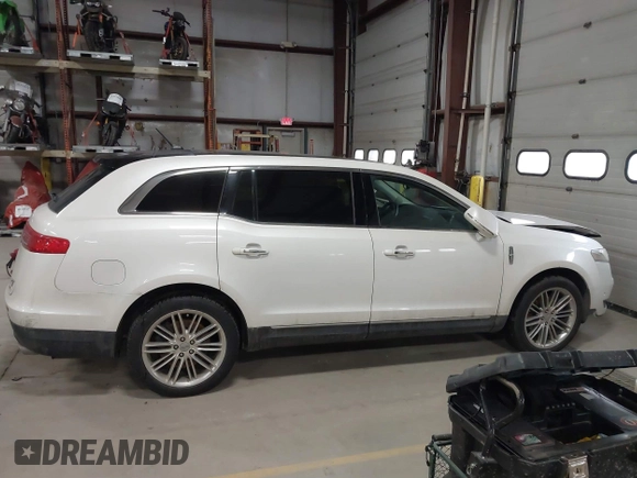 2013 Lincoln MKT EcoBoost with VIN 2LMHJ5AT3DBL56954, listed as a IAAI auction lot 41705877 with 148,771 mi miles. Bid and sale history available at carsss.com. Image 13.