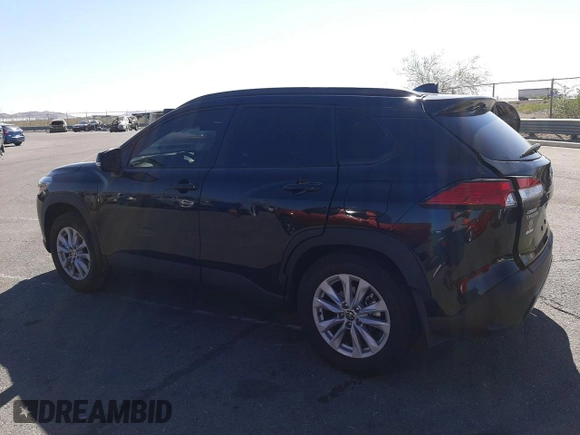 2022 Toyota Corolla Cross LE with VIN 7MUCAABG1NV033299, listed as a Copart auction lot 58018825 with 28,138 mi miles and Salvage title. Bid and sale history available at DreamBid. Image 2.