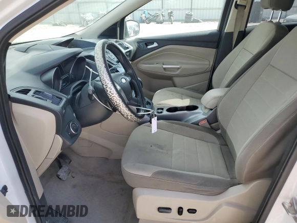 2015 Ford Escape SE with VIN 1FMCU0GX9FUC26779, listed as a Copart auction lot 52772325 with 135,121 mi miles and Salvage Title. Bid and sale history available at DreamBid. Image 7.