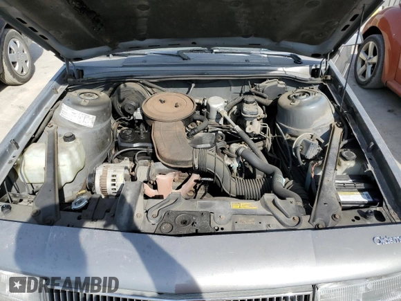 1990 Oldsmobile Cutlass z VIN 2G3AL54R2L2339637, wystawiony jako Copart lot #78364484 z przebiegiem 89 106 mil mil oraz Tytuł czysty. Historia ofert i sprzedaży dostępna na DreamBid. Obrazek 11.