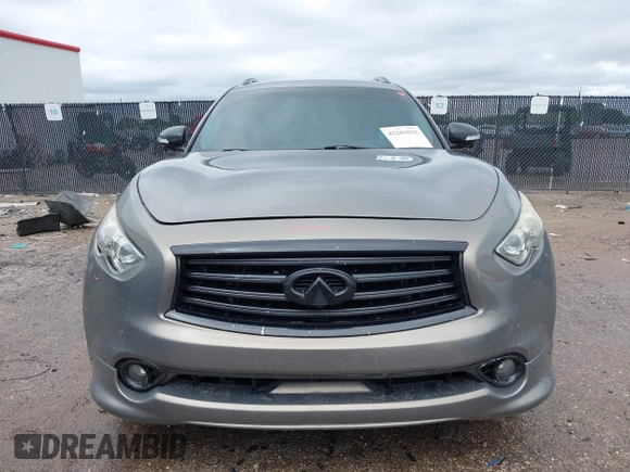 2014 Infiniti QX70 z VIN JN8CS1MU3EM451745, wystawiony jako IAAI lot #42203922 z przebiegiem 144 990 mil mil oraz . Historia ofert i sprzedaży dostępna na DreamBid. Obrazek 12.