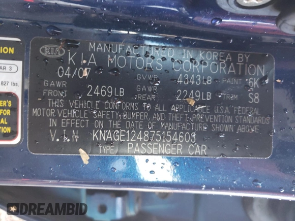 2007 Kia Optima EX with VIN KNAGE124875154603, listed as a Copart auction lot 79768494 with 76,588 mi miles and Salvage Title. Bid and sale history available at carsss.com. Image 14.