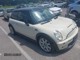 2005 MINI Hardtop S with VIN WMWRE33515TG97721, listed as a IAAI auction lot 42813176 with 84,371 mi miles and . Bid and sale history available at DreamBid. Image 1.