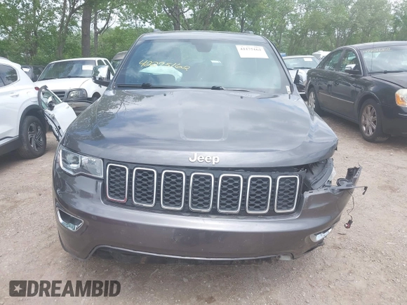 2017 Jeep Grand Cherokee Limited z VIN 1C4RJFBG9HC849409, wystawiony jako IAAI lot #42275162 z przebiegiem 98 800 mil mil oraz . Historia ofert i sprzedaży dostępna na DreamBid. Obrazek 13.