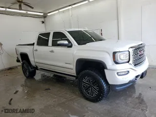 2018 GMC Sierra 1500 Denali with VIN 3GTU2PEJ9JG445453, listed as a Copart auction lot 50991655 with 114,828 mi miles and Salvage Title. Bid and sale history available at carsss.com. Image 4.