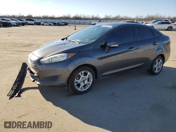 2015 Ford Fiesta SE with VIN 3FADP4BJ0FM115297, listed as a Copart auction lot 87942225 with 198,940 mi miles and Salvage Title. Bid and sale history available at DreamBid. Image 1.