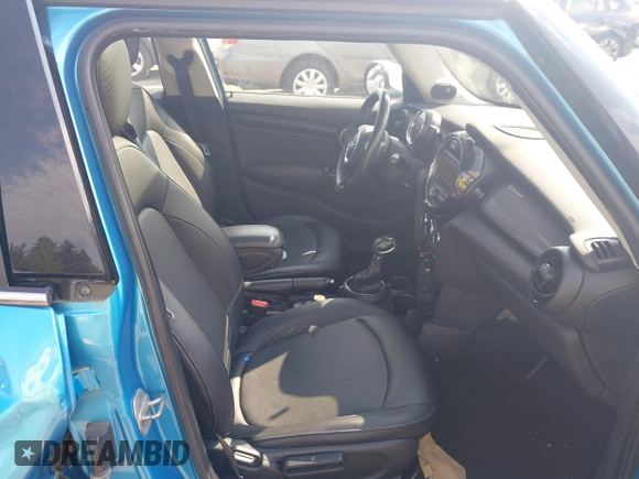 2015 MINI Hardtop 4 Door z VIN WMWXS5C51FT829693, wystawiony jako IAAI lot #42497639 z przebiegiem 36 494 mil mil oraz . Historia ofert i sprzedaży dostępna na DreamBid. Obrazek 5.