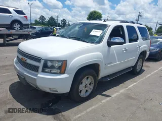 2007 Chevrolet Tahoe LTZ with VIN 1GNFC13067R365671, listed as a IAAI auction lot 42488123 with 255,079 mi miles and . Bid and sale history available at DreamBid. Image 2.