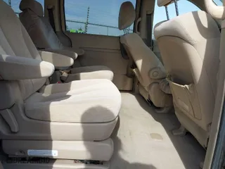 2007 Kia Sedona EX with VIN KNDMB233576109557, listed as a IAAI auction lot 41813984 with 204,856 mi miles. Bid and sale history available at carsss.com. Image 8.