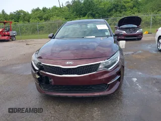 2016 Kia Optima LX with VIN 5XXGT4L32GG105361, listed as a IAAI auction lot 42066431 with 61,026 mi miles. Bid and sale history available at carsss.com. Image 12.