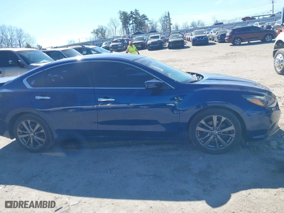 2018 Nissan Altima 2.5 SL with VIN 1N4AL3AP1JC294068, listed as a IAAI auction lot 41639471 with 100,772 mi miles. Bid and sale history available at carsss.com. Image 13.