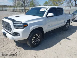 2023 Toyota Tacoma 4WD SR with VIN 3TMCZ5AN8PM647523, listed as a IAAI auction lot 41887896 with 17,864 mi miles. Bid and sale history available at carsss.com. Image 2.