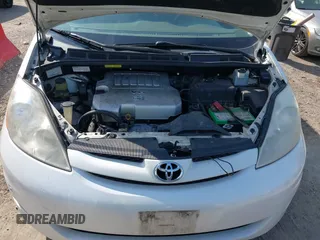 2009 Toyota Sienna XLE with VIN 5TDZK22C19S262107, listed as a IAAI auction lot 42158864 with 186,711 mi miles. Bid and sale history available at carsss.com. Image 10.