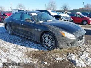 2014 Maserati Quattroporte S Q4 with VIN ZAM56RRA3E1123504, listed as a IAAI auction lot 41395299 with 49,192 mi miles. Bid and sale history available at carsss.com. Image 1.
