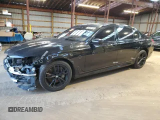 2018 BMW 7 Series 750i xDrive with VIN WBA7F2C52JB238743, listed as a Copart auction lot 74258744 with 0 mi miles and Salvage Title. Bid and sale history available at carsss.com. Image 1.