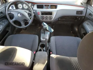 2006 Mitsubishi Lancer OZ-Rally with VIN JA3AJ86E16U059013, listed as a Copart auction lot 80056014 with 107,179 mi miles and Clean Title. Bid and sale history available at DreamBid. Image 8.