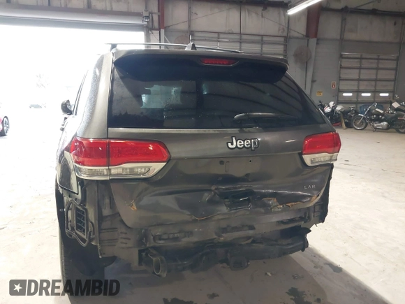 2014 Jeep Grand Cherokee Laredo with VIN 1C4RJEAG7EC145023, listed as a IAAI auction lot 40518825 with 115,098 mi miles and . Bid and sale history available at DreamBid. Image 6.