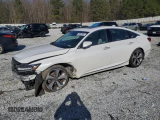 2018 Honda Accord Touring z VIN 1HGCV2F97JA033347, wystawiony jako Copart lot #45897565 z przebiegiem 166 964 mil mil oraz Szkoda całkowita • Salvage title. Historia ofert i sprzedaży dostępna na DreamBid. Obrazek 1.