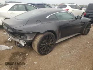 2023 Aston Martin Vantage z VIN SCFSMGAW7PGN07196, wystawiony jako Copart lot #55477894 z przebiegiem 2195 mil mil oraz Szkody całkowita. Historia ofert i sprzedaży dostępna na DreamBid. Obrazek 3.