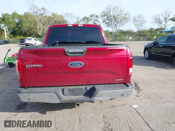 2015 Ford F-150 XLT with VIN 1FTEW1C87FKD70547, listed as a IAAI auction lot 41451841 with 151,596 mi miles and . Bid and sale history available at carsss.com. Image 17.