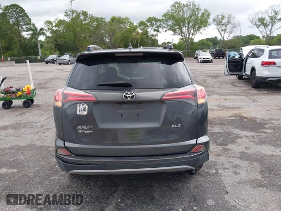 2017 Toyota RAV4 XLE with VIN JTMWFREVXHD096998, listed as a IAAI auction lot 41997925 with 119,564 mi miles and . Bid and sale history available at DreamBid. Image 16.