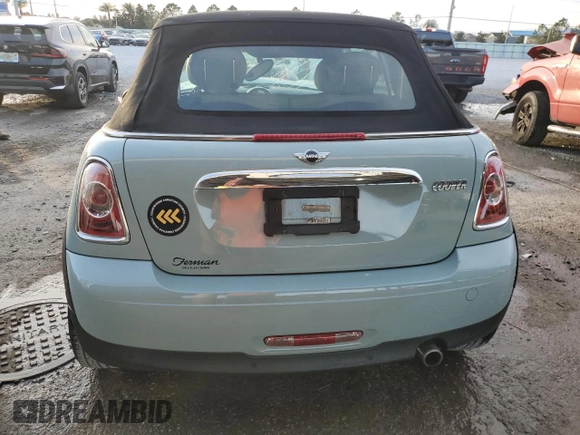 2012 MINI Convertible z VIN WMWZN3C59CT135351, wystawiony jako Copart lot #86711044 z przebiegiem 93 515 mil mil oraz Nie do naprawy • Non repairable. Historia ofert i sprzedaży dostępna na DreamBid. Obrazek 6.