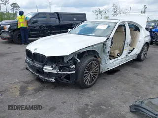 2018 BMW 5 Series 530i with VIN WBAJA5C55JWA38747, listed as a IAAI auction lot 41922937 with 100,951 mi miles and . Bid and sale history available at DreamBid. Image 2.