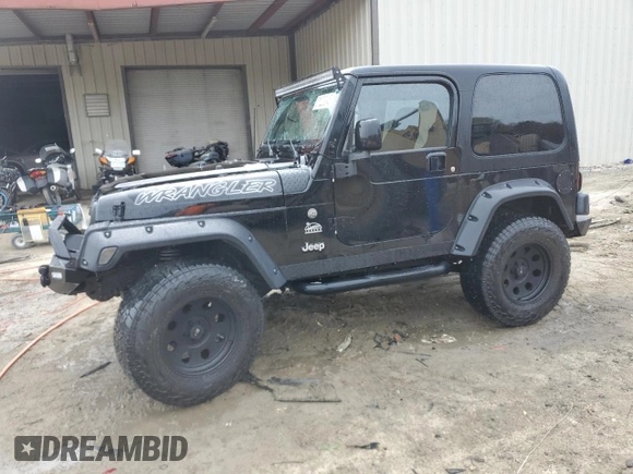 2004 Jeep Wrangler Sahara with VIN 1J4FA59SX4P722608, listed as a Copart auction lot 51223345 with 146,600 mi miles and Salvage title. Bid and sale history available at DreamBid. Image 1.